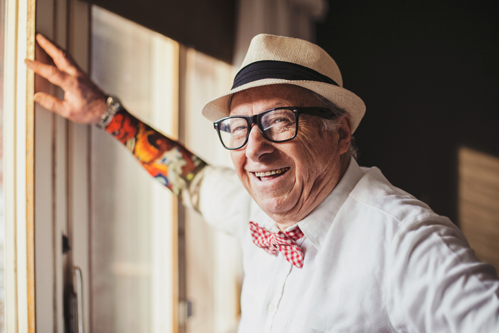 Senior man smiling and looking into the camera