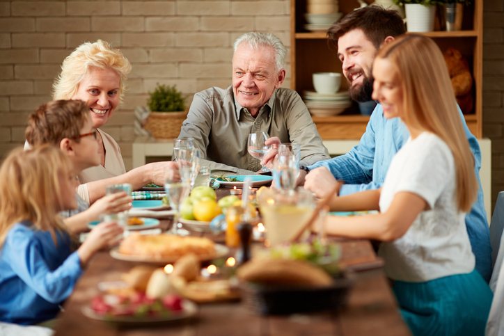 Family around the table talking