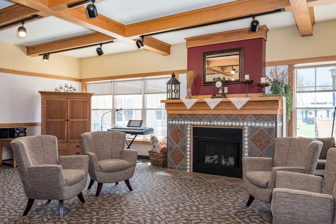 Windsor Manor Grinnell sitting area with fireplace