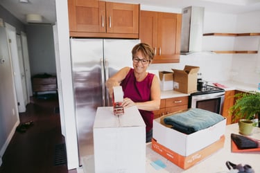 woman packing up a box