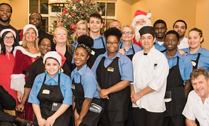 Group of workers with Santa. 