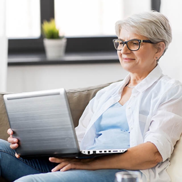 Woman using a laptop computer. 