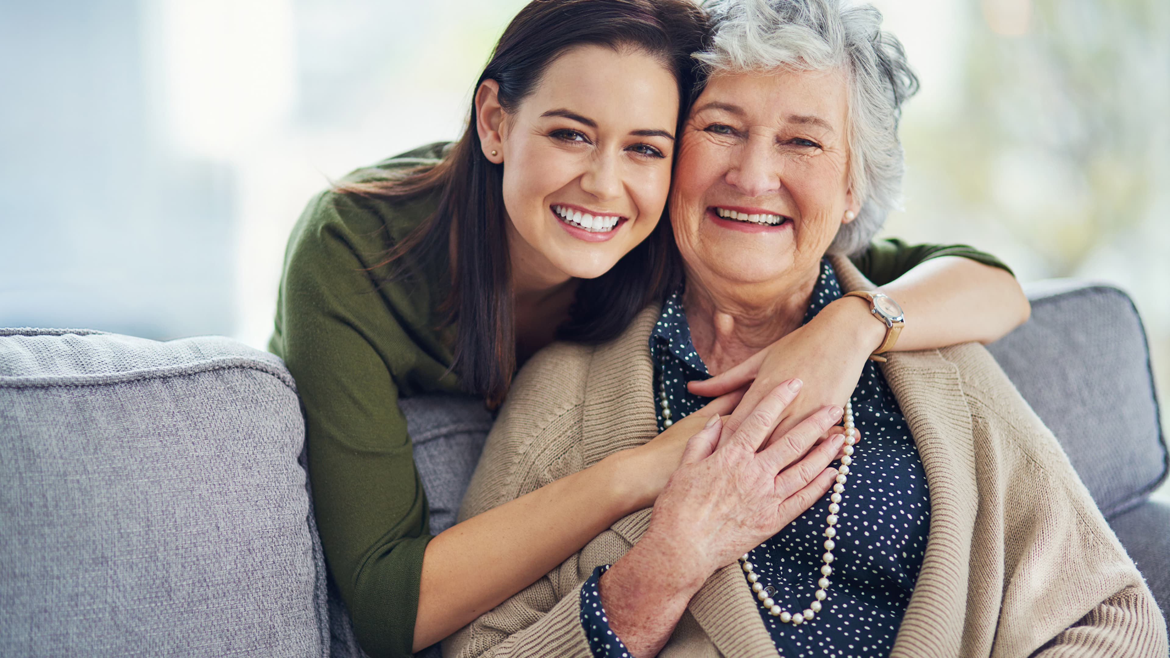 adult child hugging parent